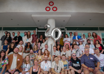 Spindogs team group photo from the agency's 20th anniversary for Resource Guru customer success story.