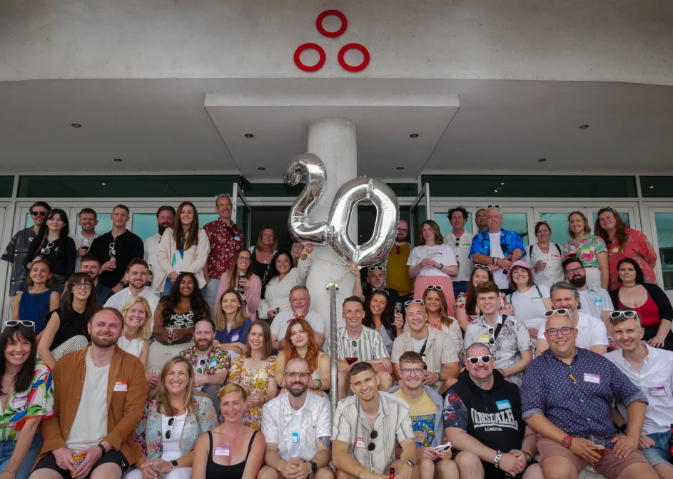 Spindogs team group photo from the agency's 20th anniversary for Resource Guru customer success story.