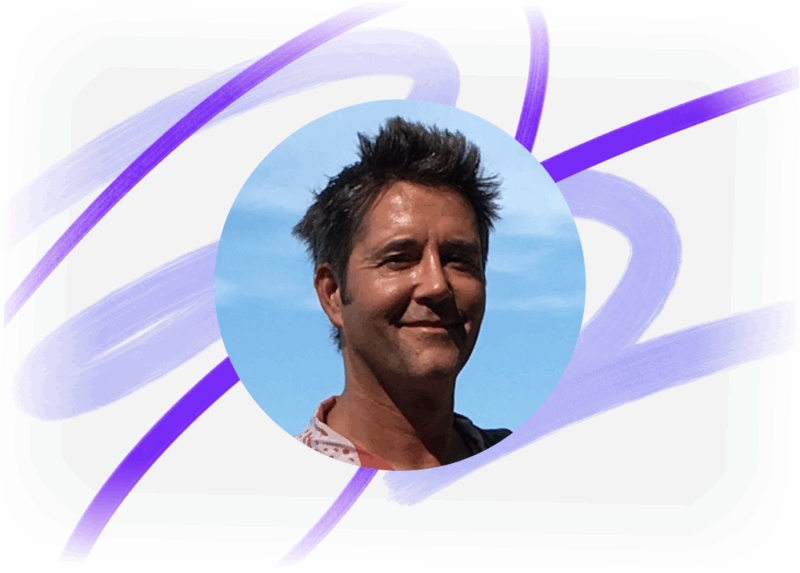 Headshot of Resource Guru's Co-Founder Percy Stilwell with purple streamers in the background.