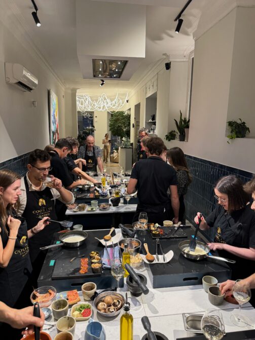 The Resource Guru team at a cooking class in Madrid.