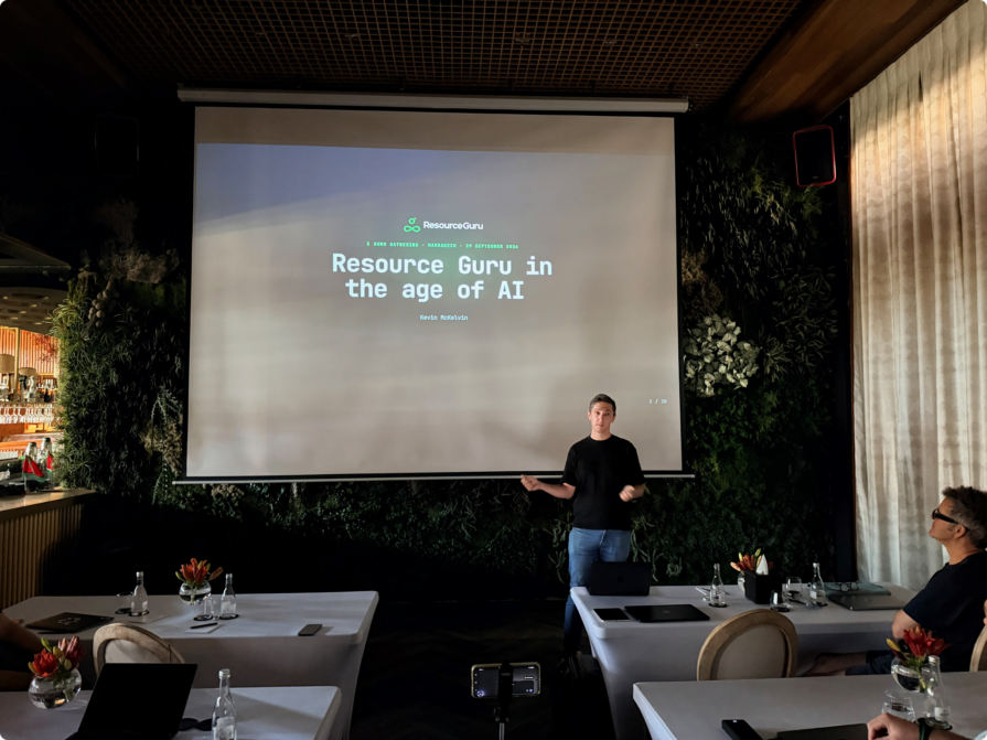Presentation title slide that reads "Resource Guru in the Age of AI."